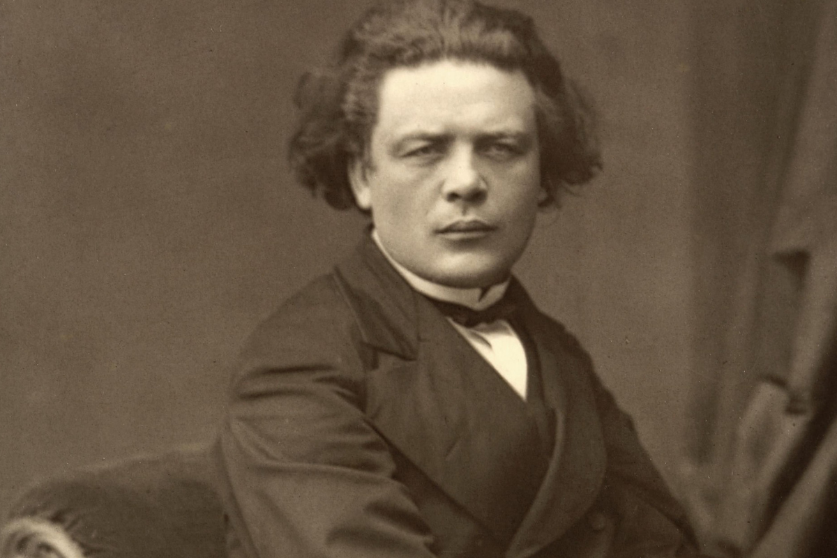 Sepia portrait photograph of man in formal nineteenth-century suit